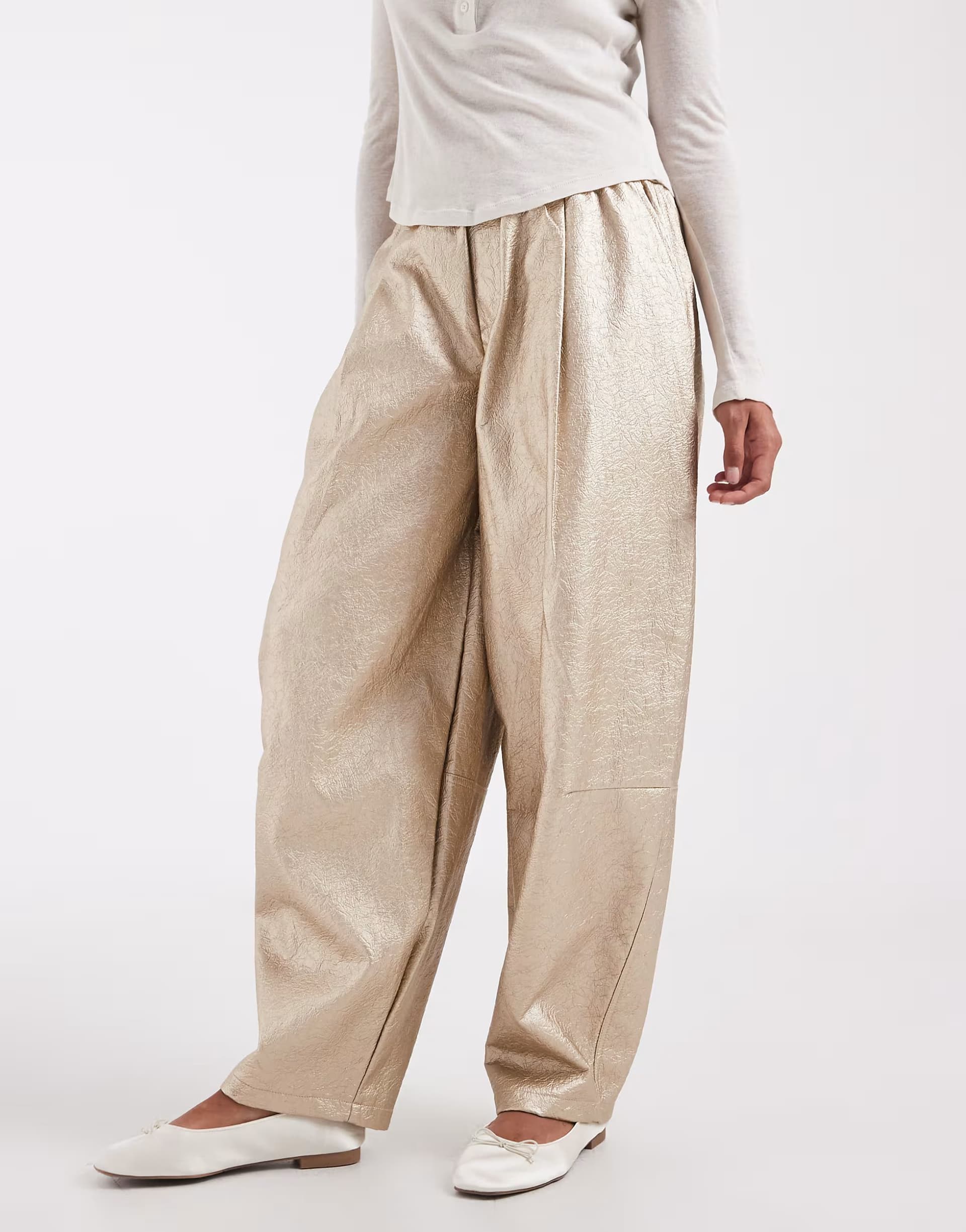 ASOS ASOS DESIGN Tailored faux leather tapered trouser in textured gold