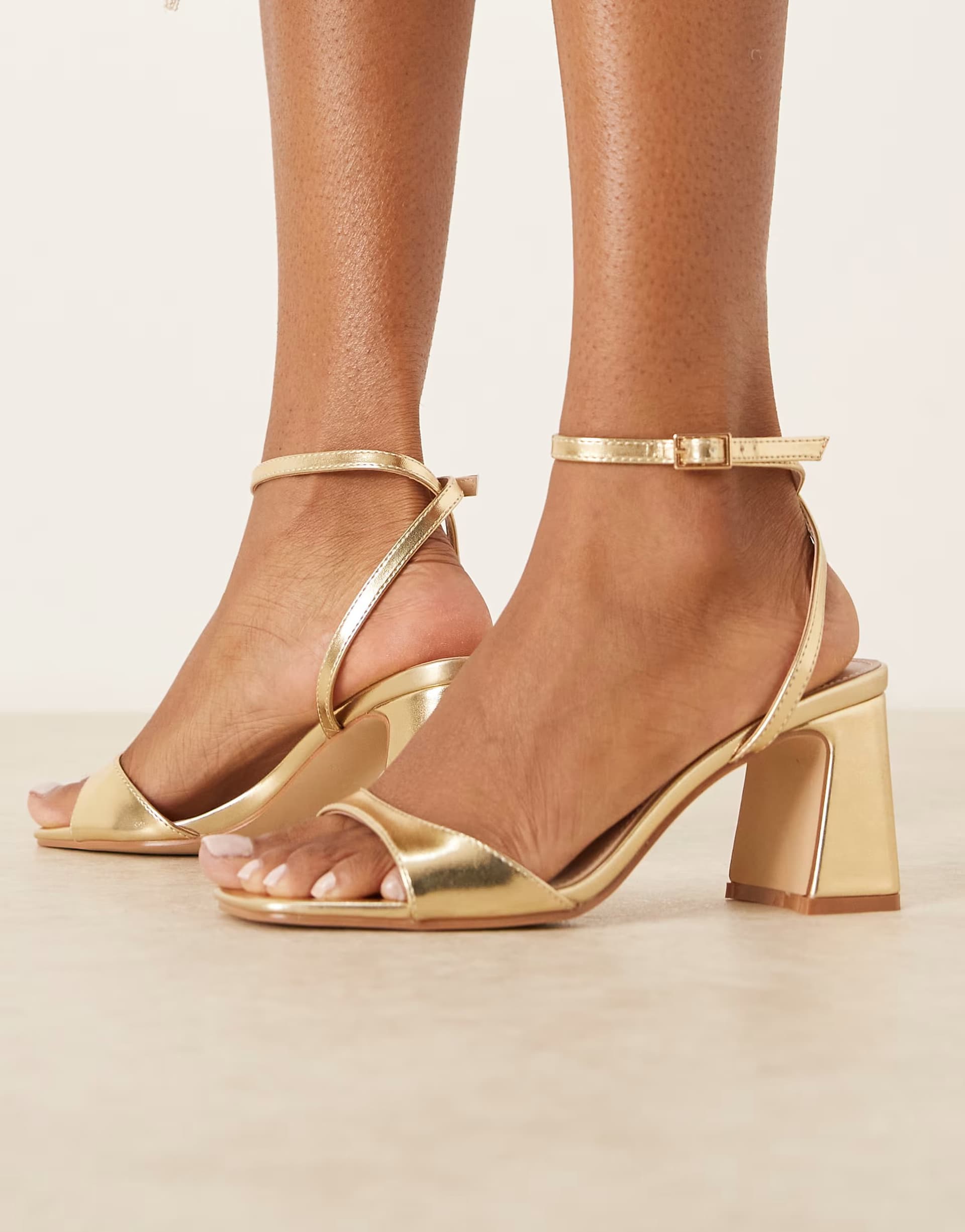 ASOS RAID Cora block heeled sandals in gold