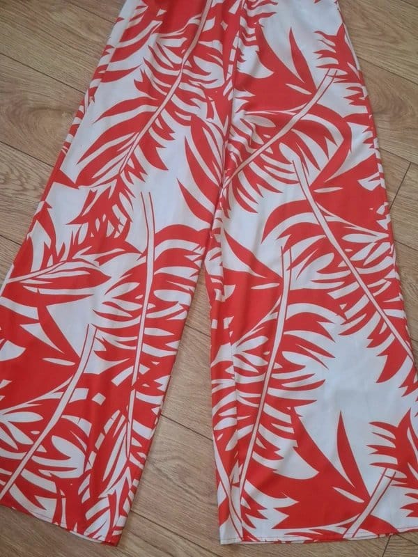 Boutique Coral Tropical Leaf Print Jumpsuit | UK 8–10