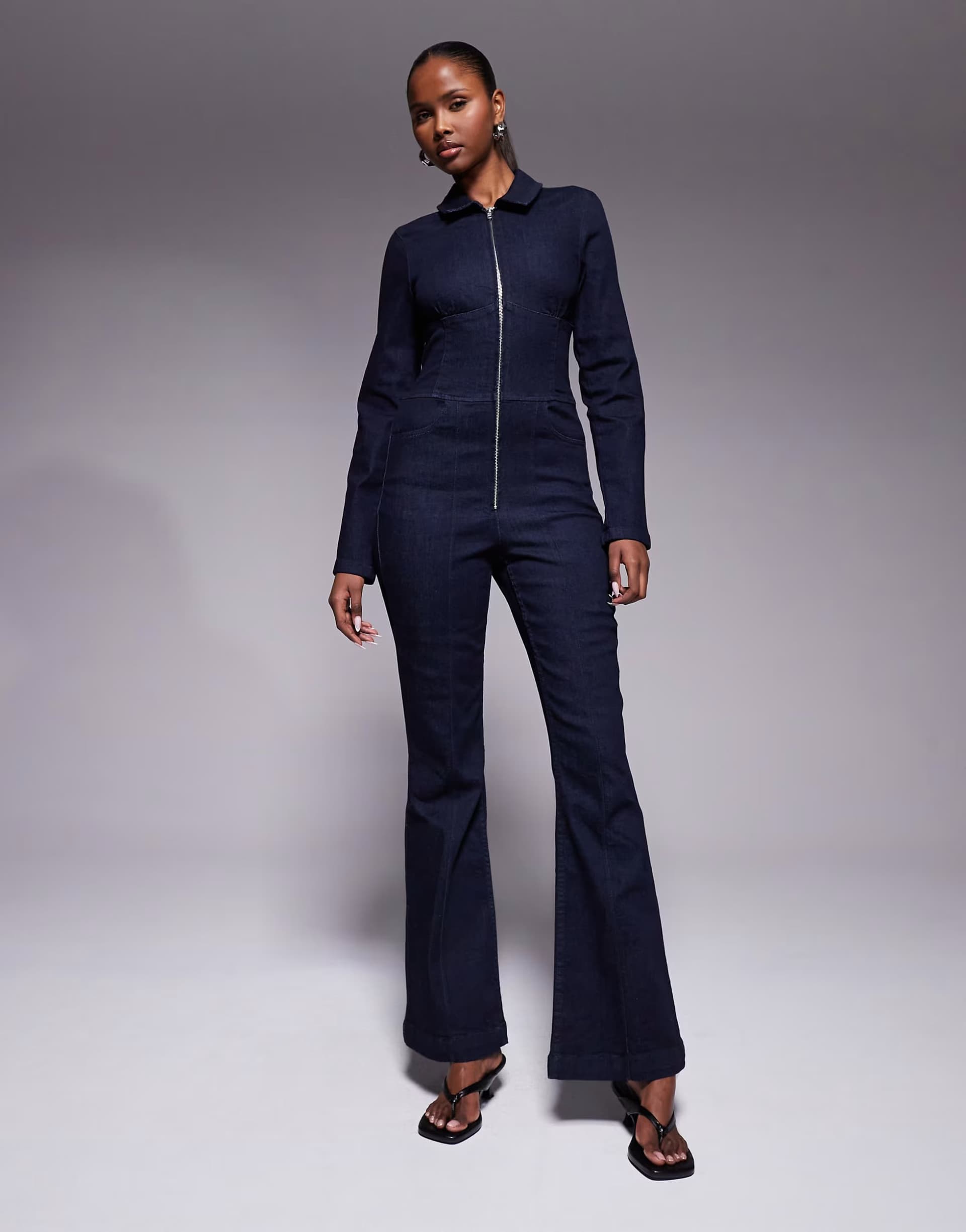 ASOS ASOS DESIGN stretch denim jumpsuit with corset waist in inky wash