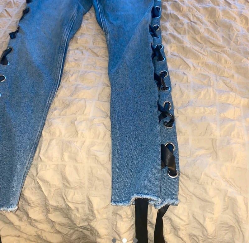Monki Monki monokom light blue denim wash straight leg jeans with black ribbon detail