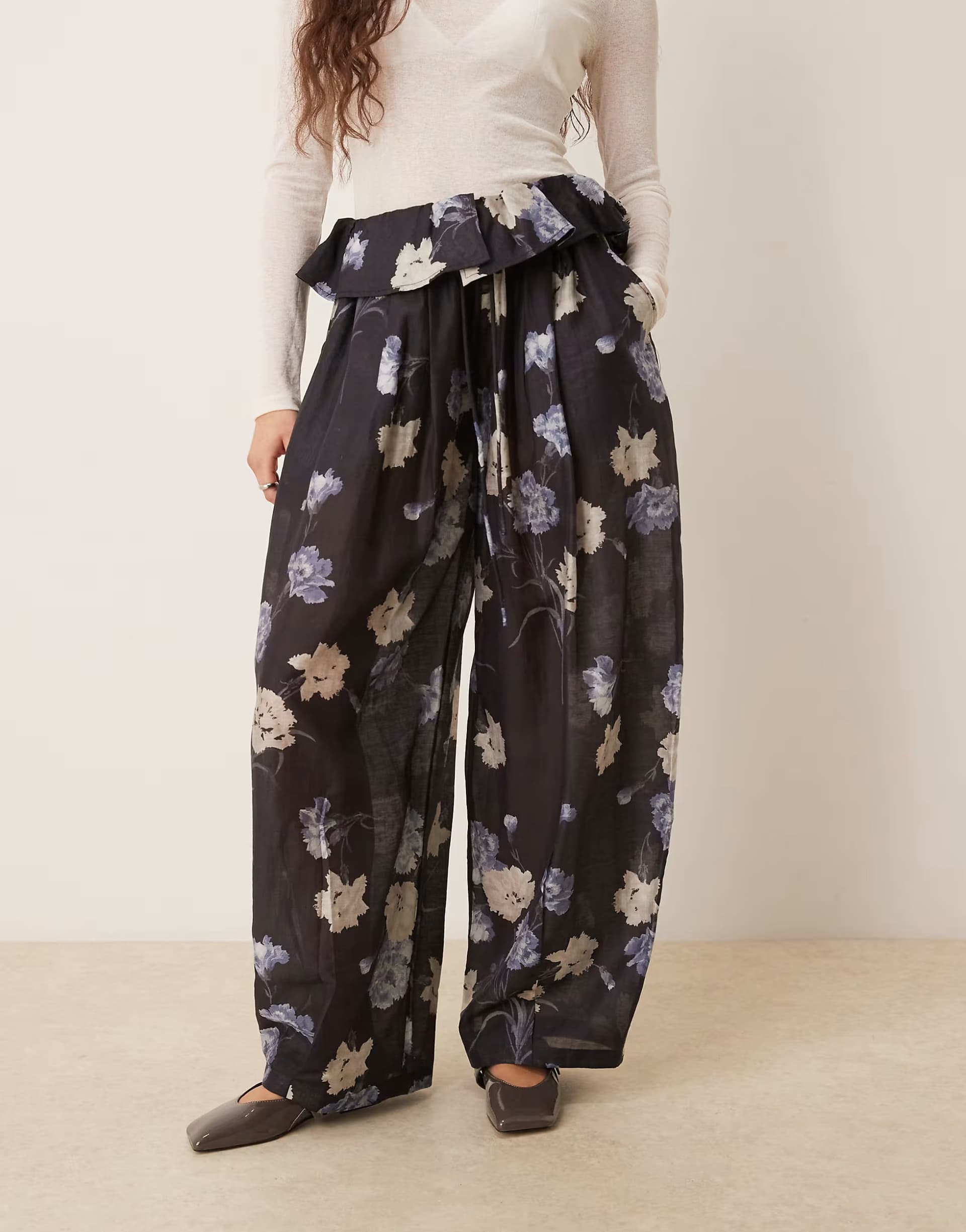 ASOS ASOS DESIGN frill waist detail balloon trousers in black floral print