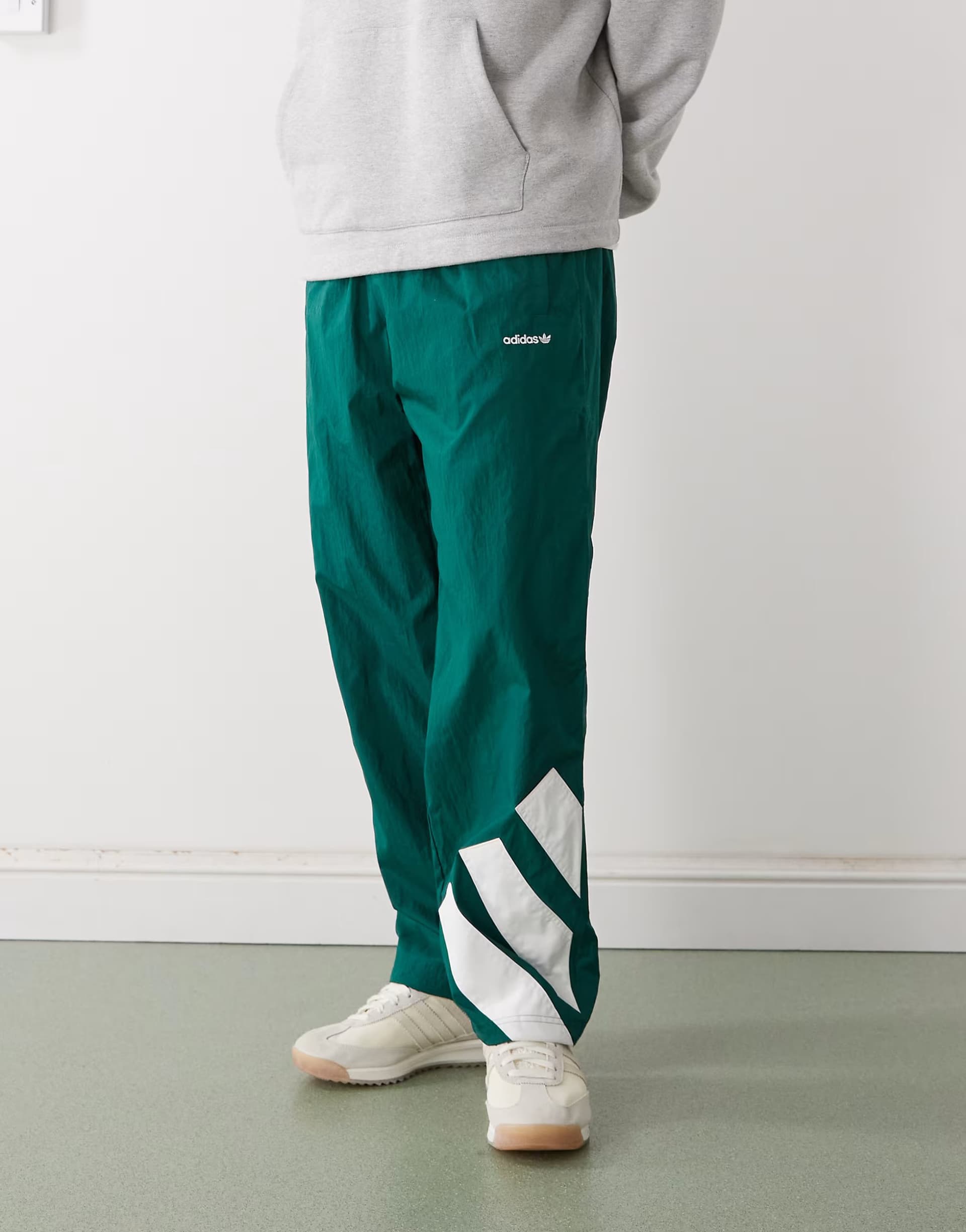 ASOS adidas Originals Adicolor blocked trackpants in green and white