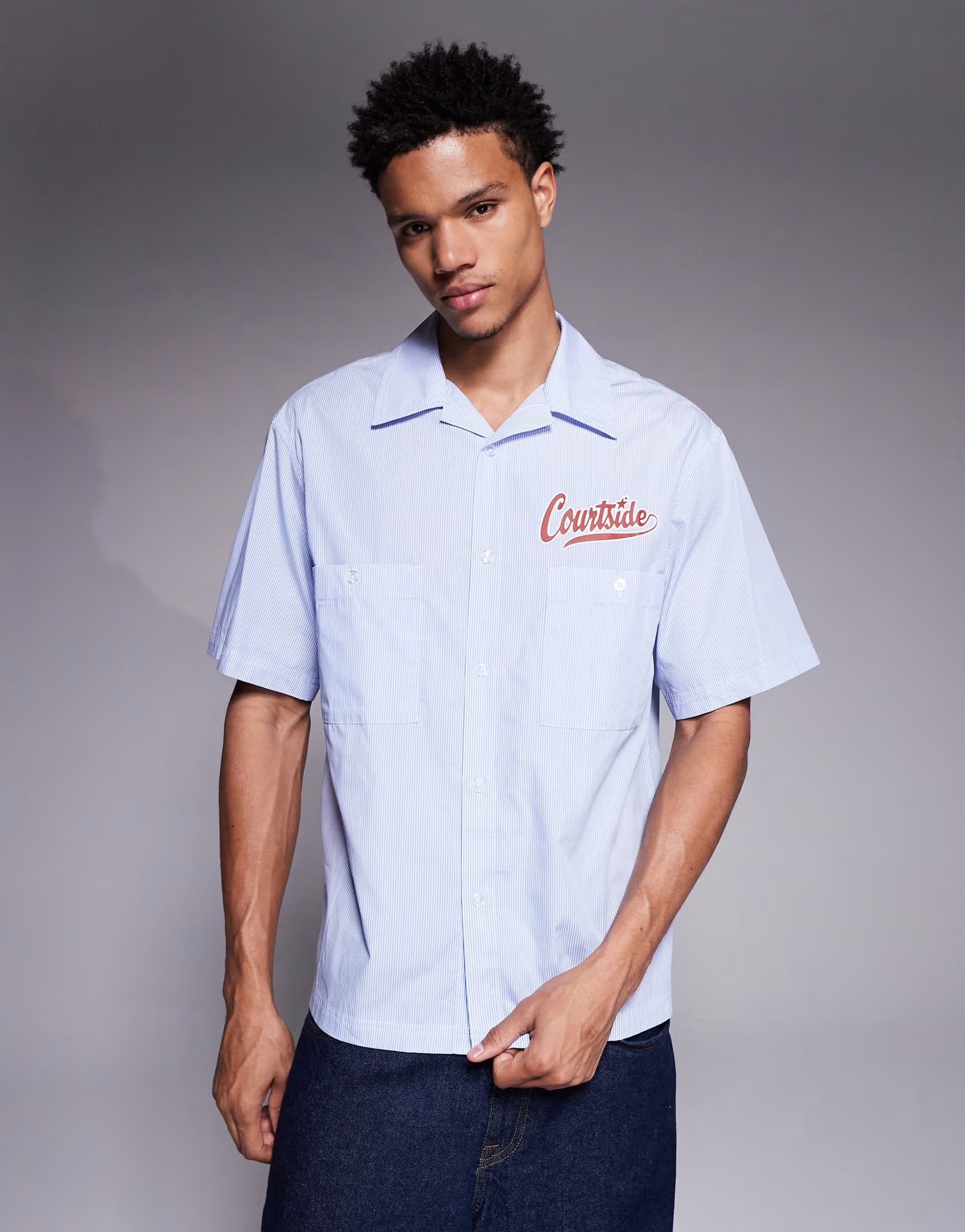 ASOS Courtside boxy revere collared striped shirt in blue with logo print
