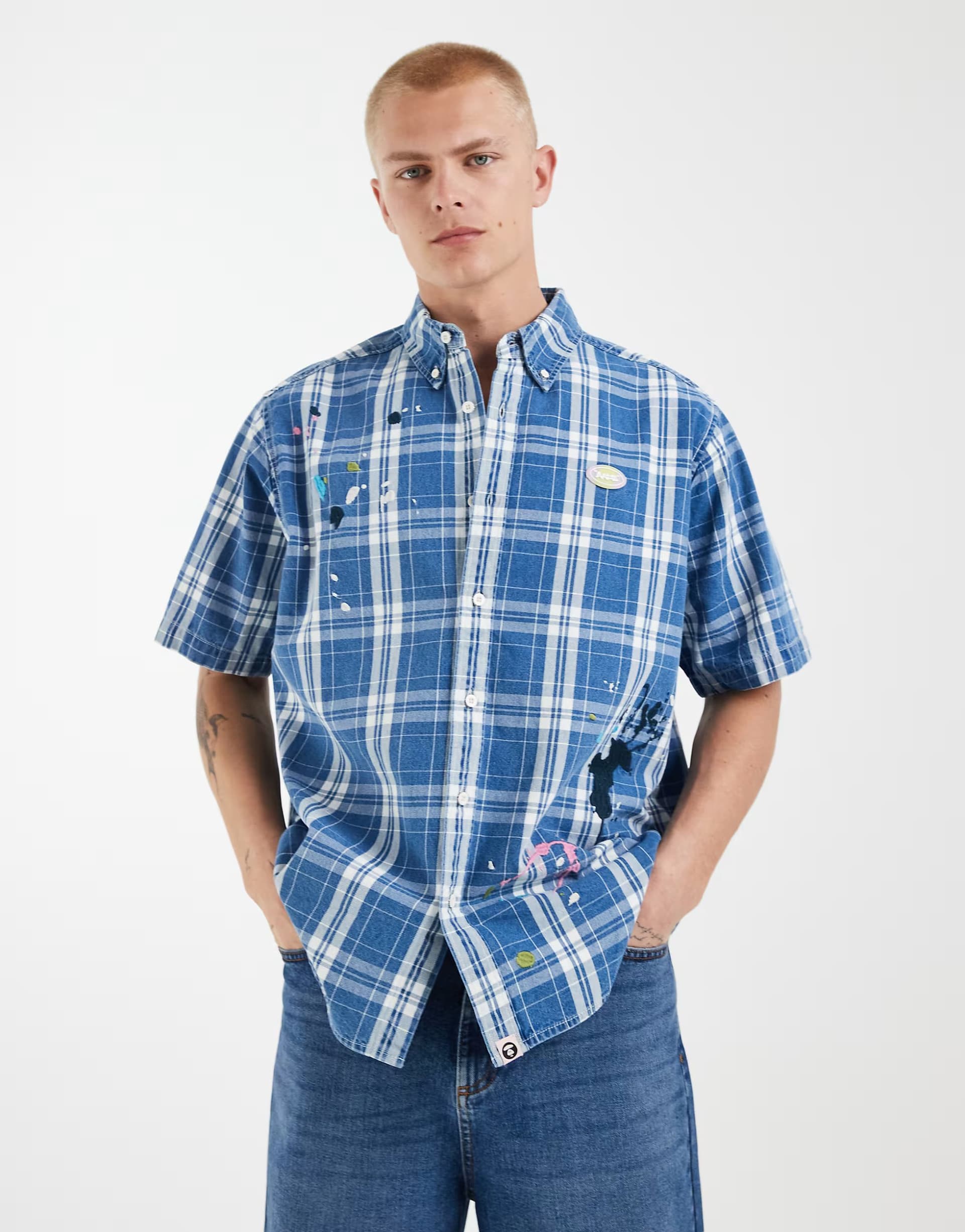 ASOS Aape by A Bathing Ape short sleeve checked shirt in blue and white with hem splatter