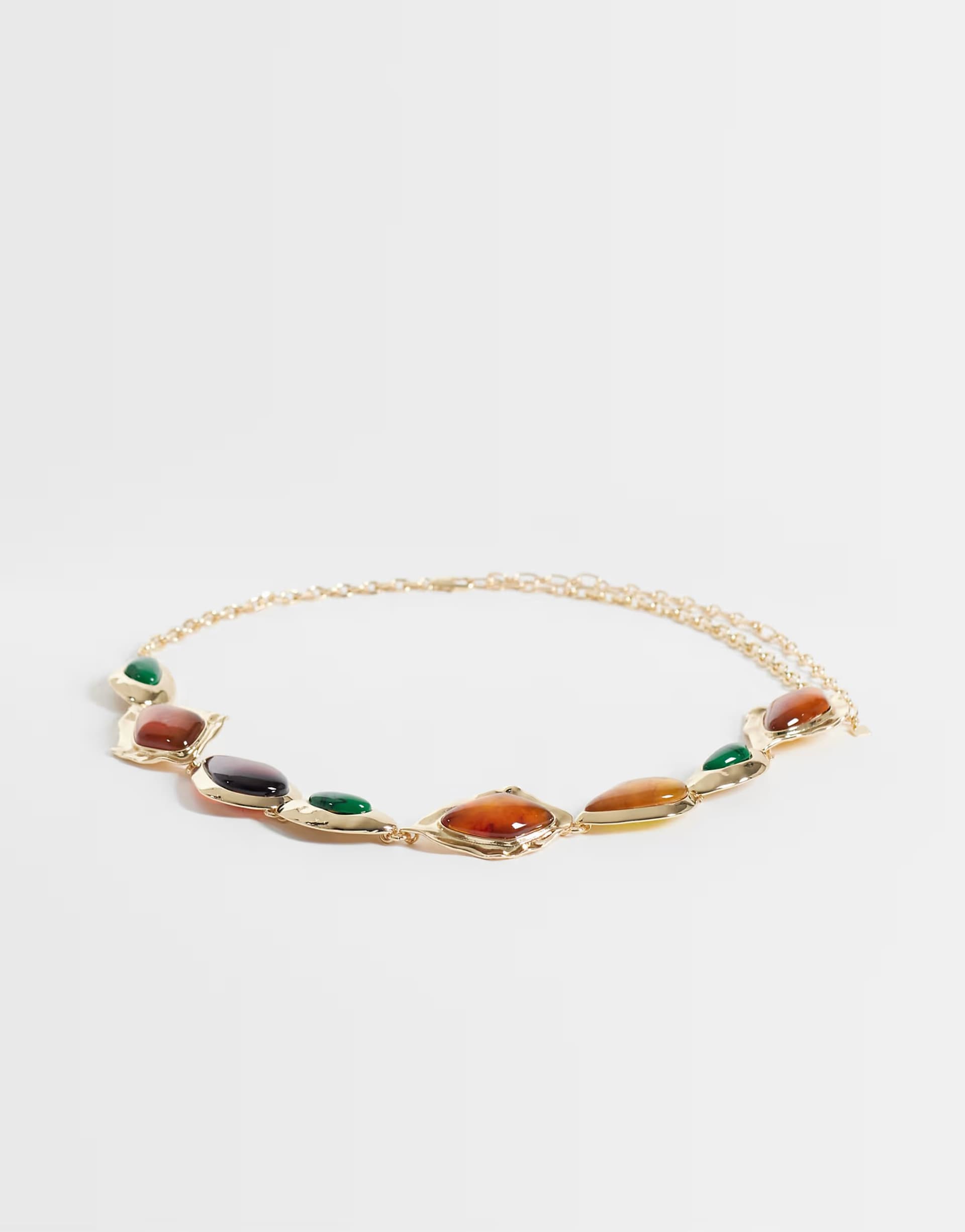ASOS ASOS DESIGN waist and hip resin stone set chain belt in gold