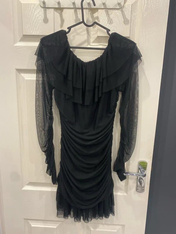 Only black long-sleeved mini dress