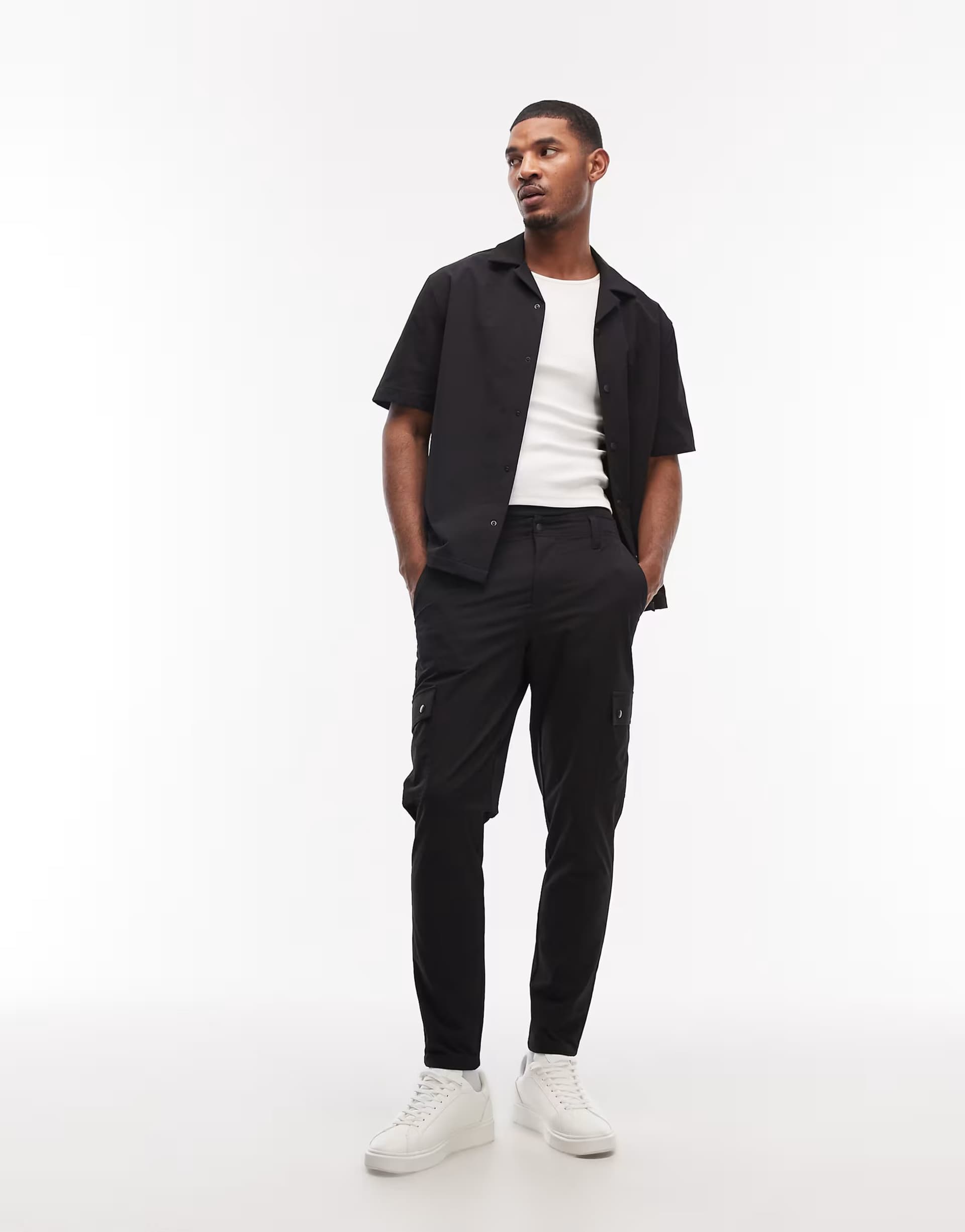 ASOS ASOS DESIGN motionMAX™ four way stretch co-ord tapered cargo trousers in black