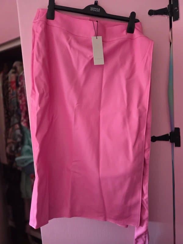 Never Fully Dressed Never fully dressed pink leather wrap skirt