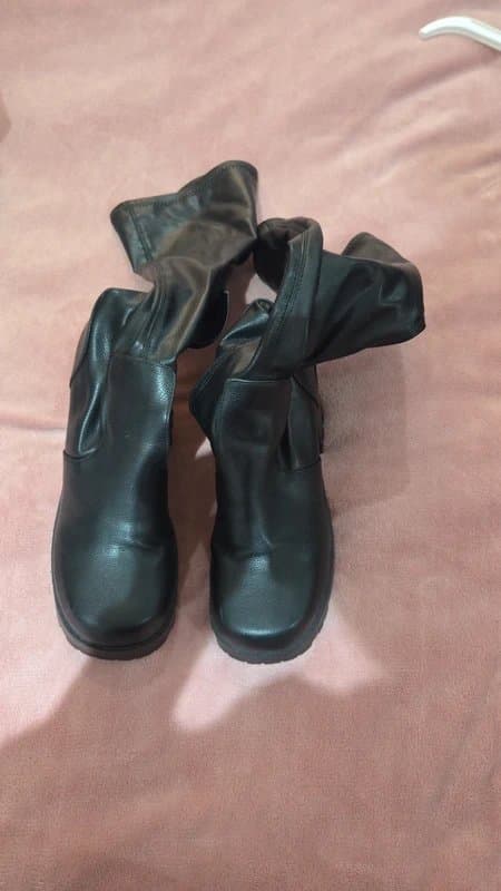 ASOS Calf length black leather boots.