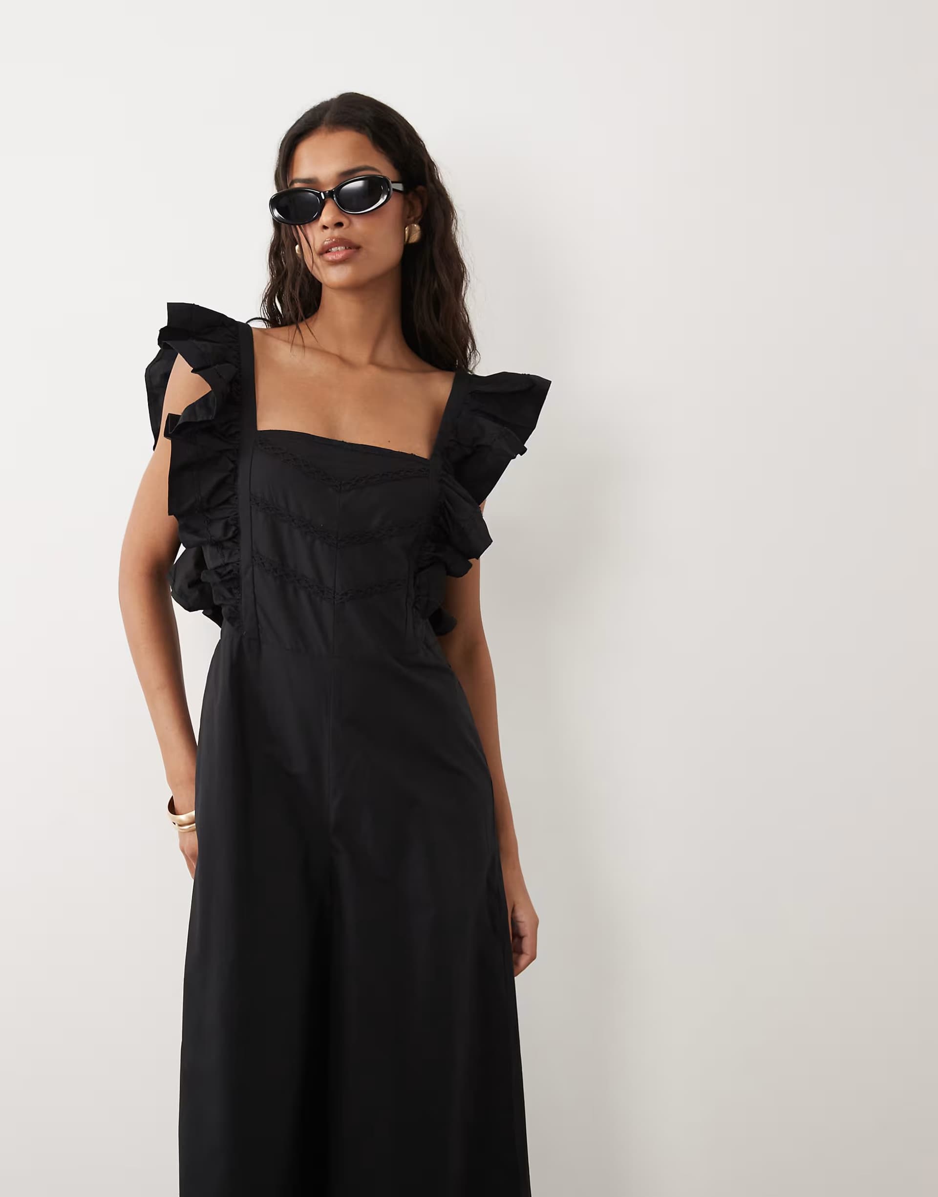 ASOS ASOS DESIGN pinny jumpsuit with ruffles in black