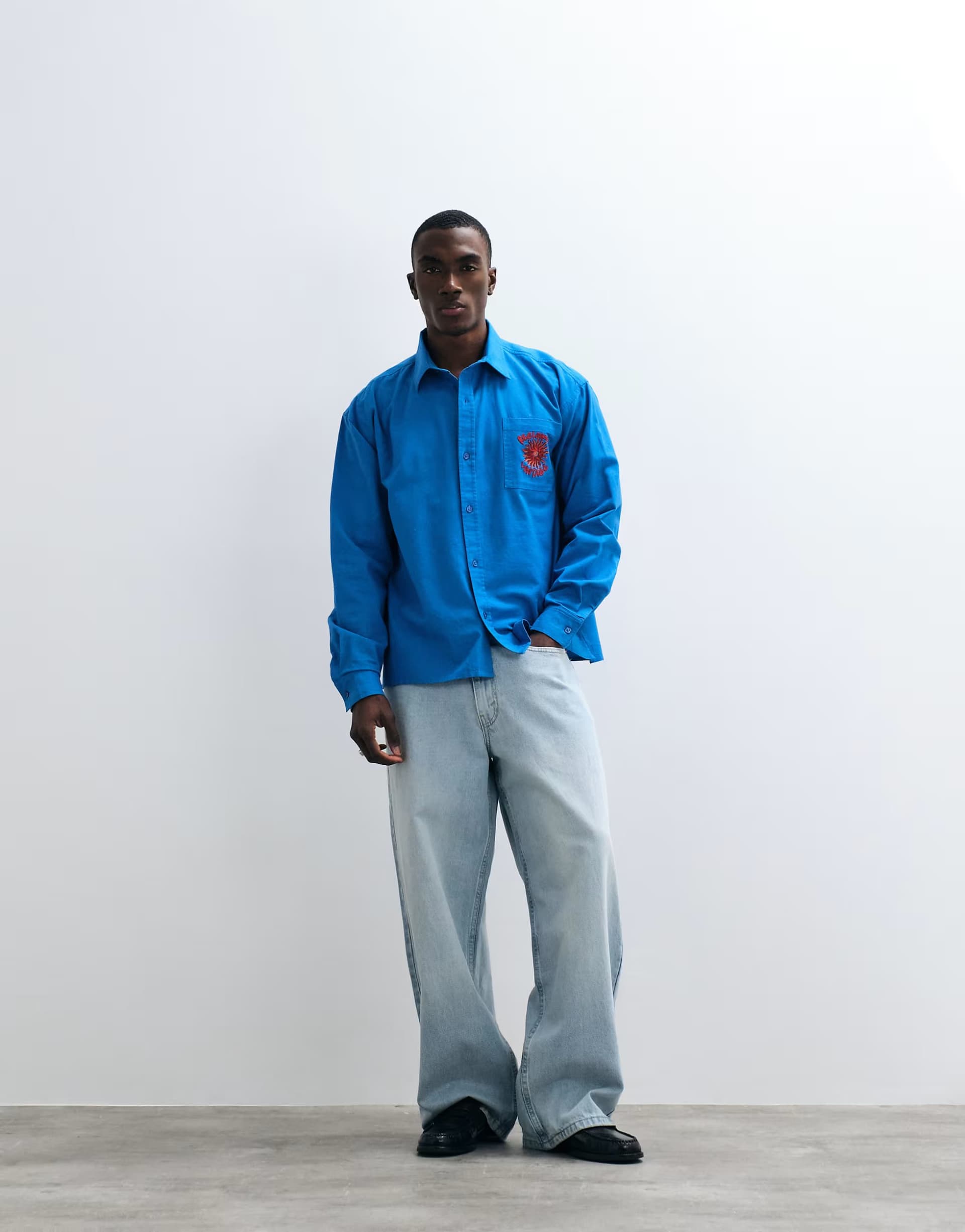 ASOS Reclaimed Vintage oversized relaxed shirt with logo in cobalt blue