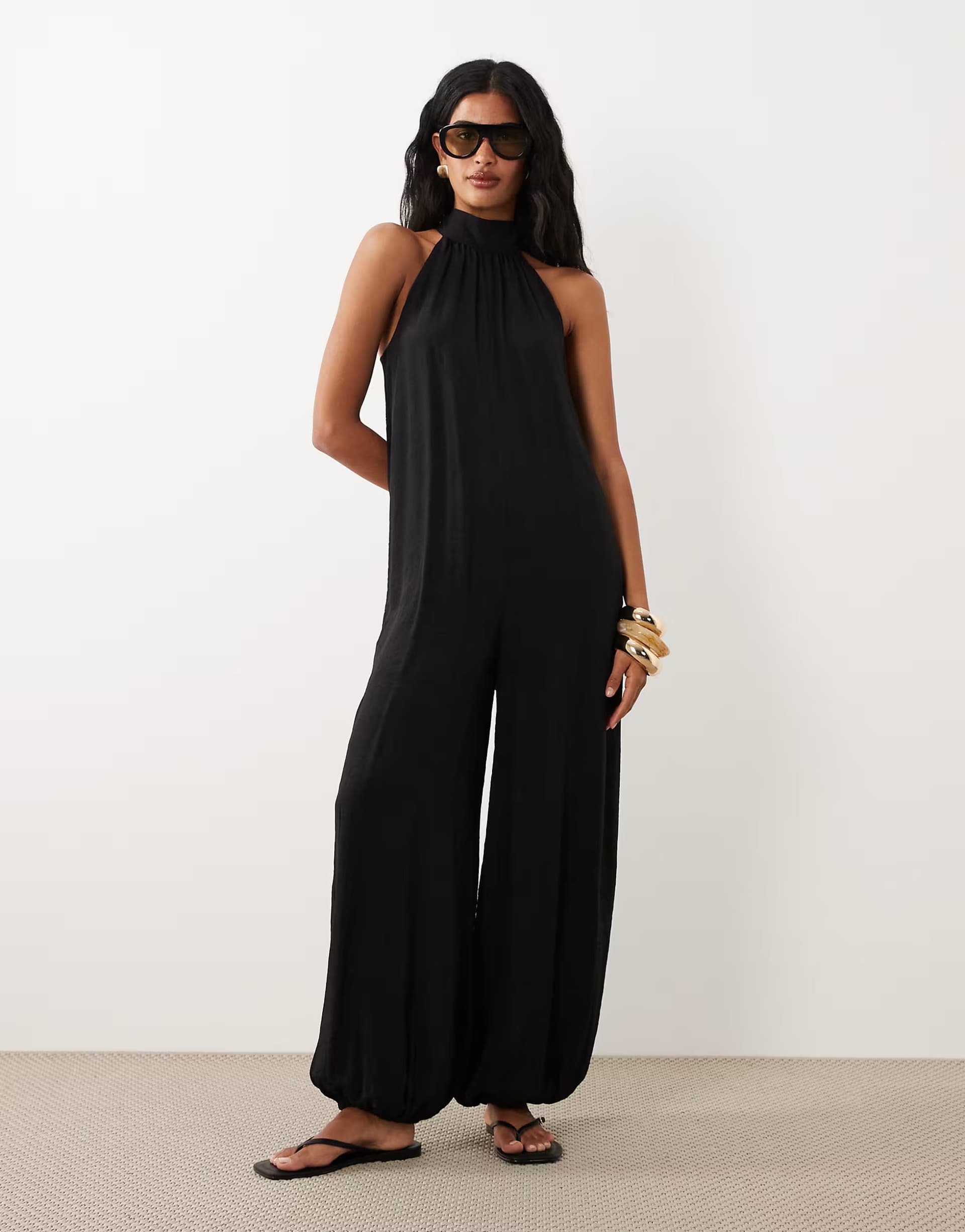 ASOS ASOS DESIGN halter neck jumpsuit with tie detail in black