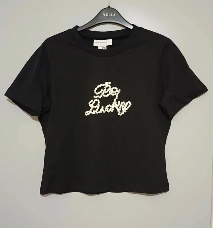 Never Fully Dressed Never Fully Dressed Black Be Lucky Baby Tee - size L (14/16)