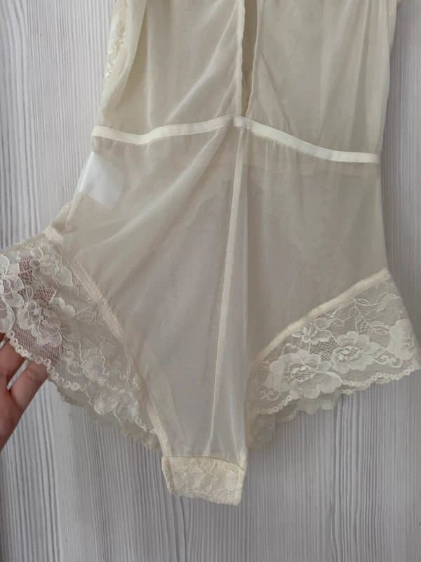 dainty Lace Round Neckline Solid Cut Out See-Through Bodysuit