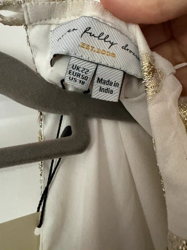Never Fully Dressed Never fully dressed Gold and white jumpsuit size 22