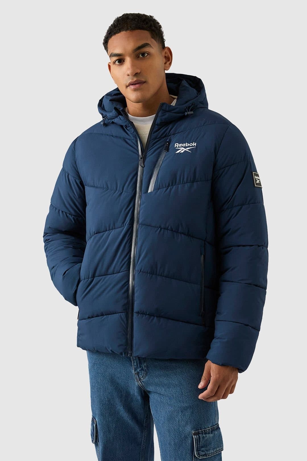 Reebok Reebok Men's Stretch Puffer Jacket in Navy