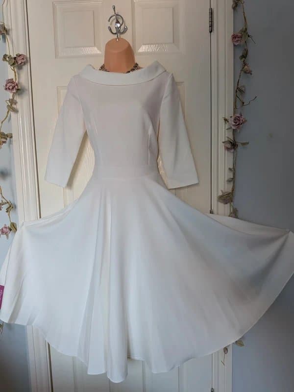 The Pretty Dress Company 🤍 The Pretty Dress Company Kennedy Ivory Roll Neck Bracelet Sleeve Fit & Flare Dress Size 10 🤍