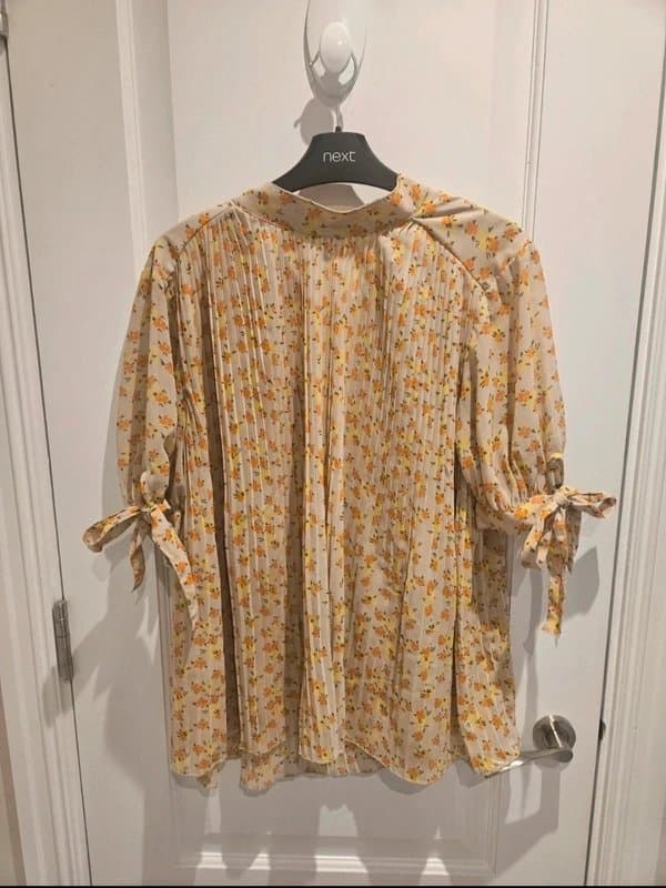 ASOS Design Light and flowy yellow and orange floral blouse with tie sleeves