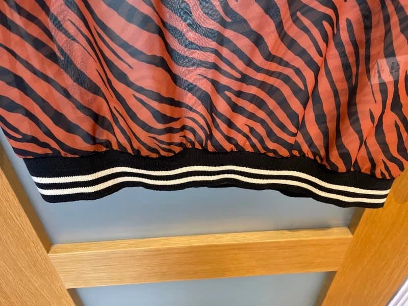 Look Again Chiffon oversized long sleeved animal print top with detailing round cuffs neck and waistband