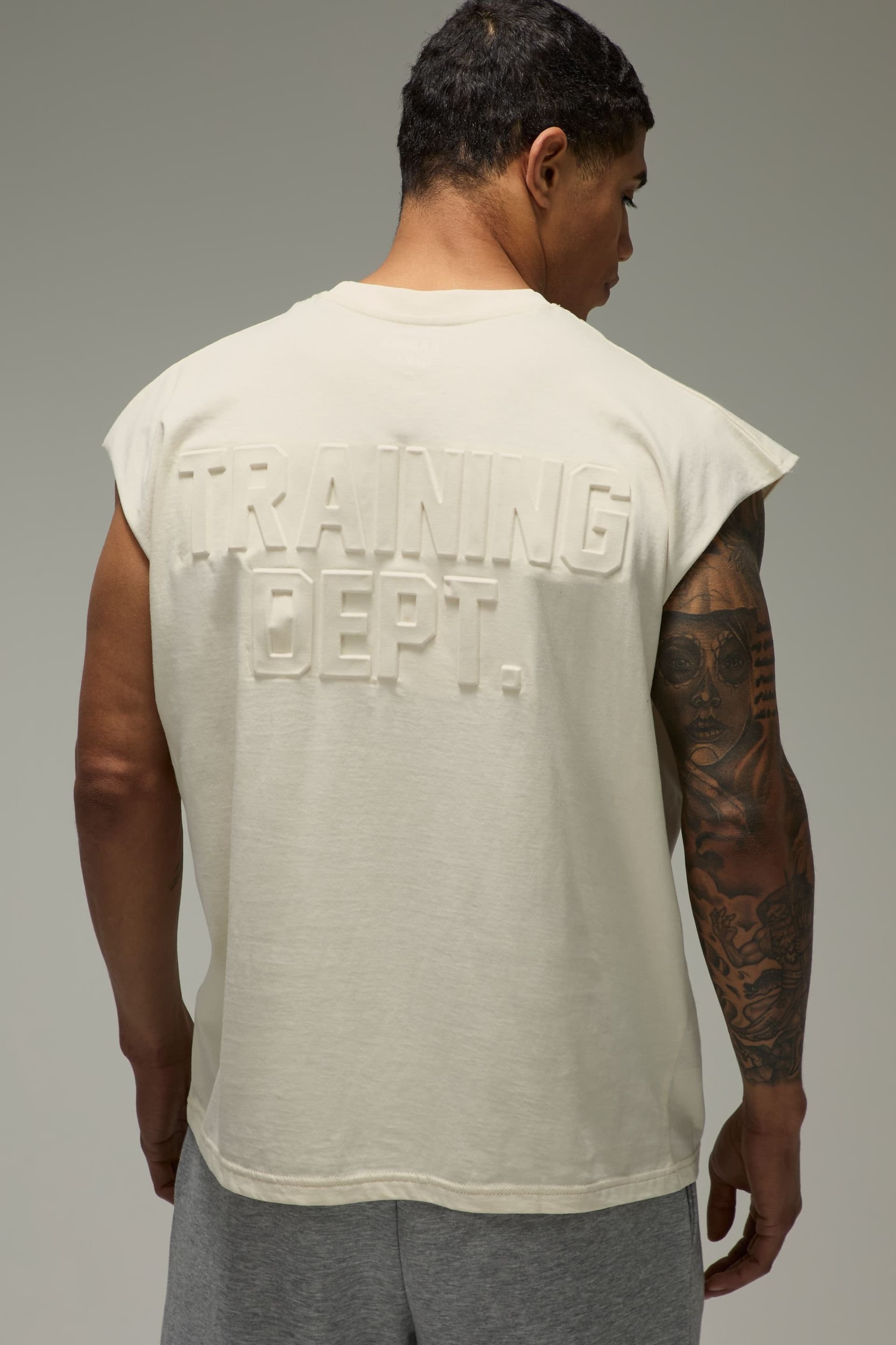 Training Dept. Training Dept. Men's Training Dept Oversized Embossed Tank in Off-White