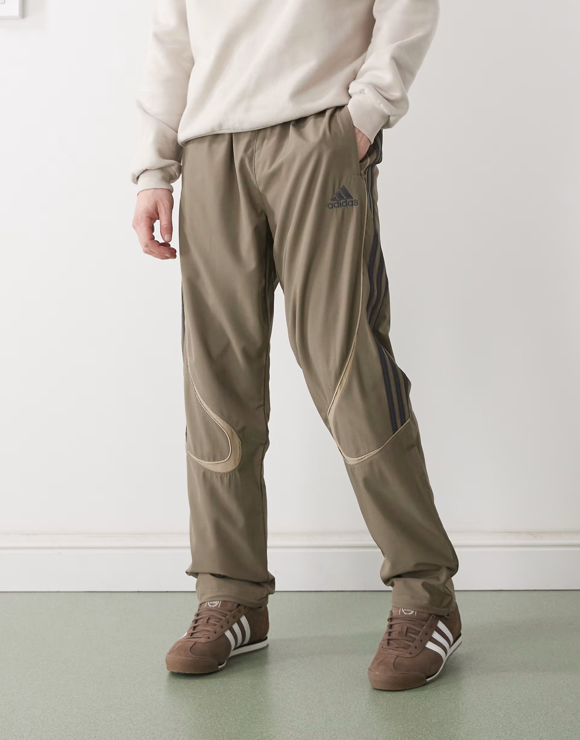 ASOS adidas Originals Teamgeist adicolor track pants in brown - 1