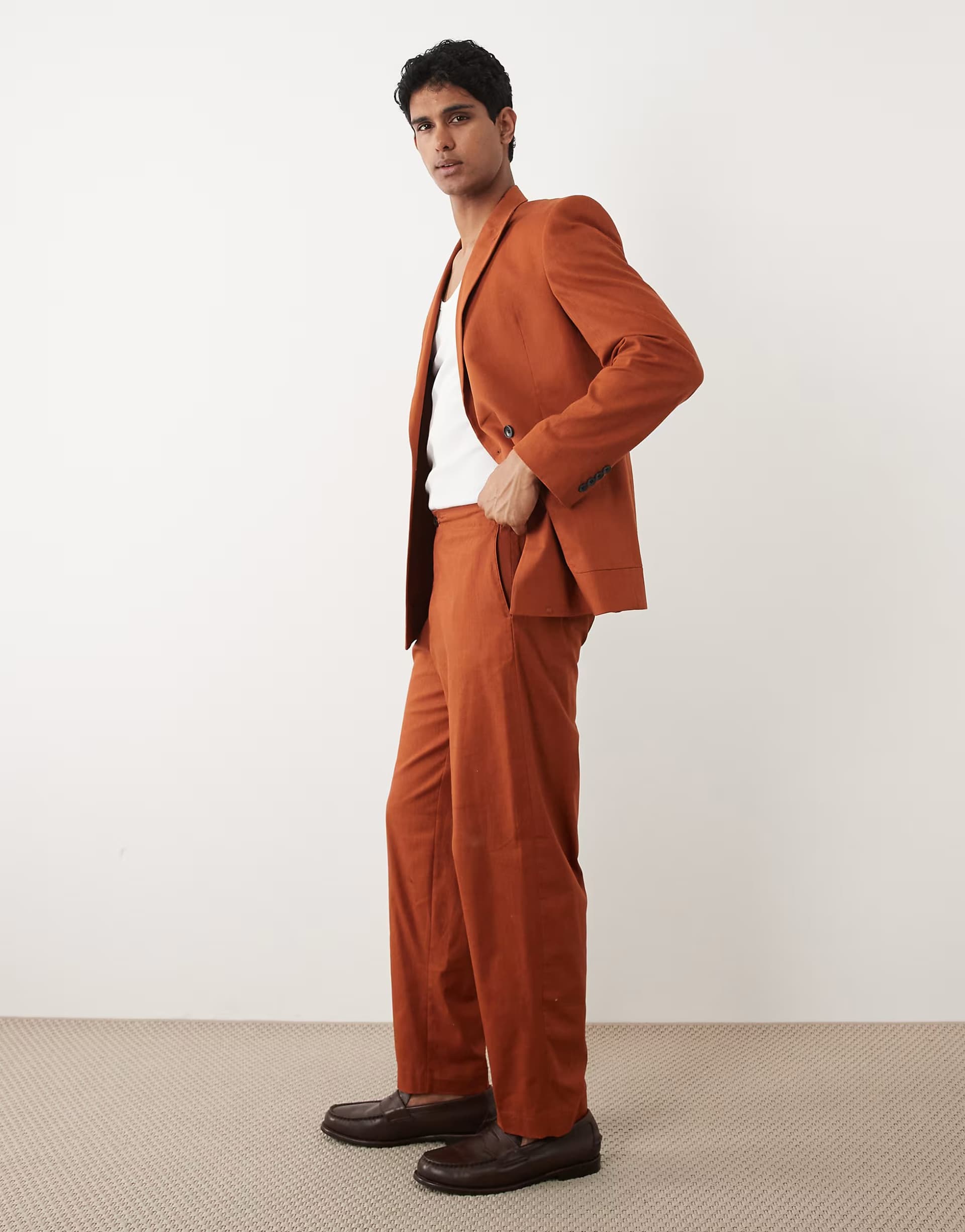 ASOS ASOS DESIGN 100% cotton linen look oversized tapered suit trousers with elasticated waist in burnt orange