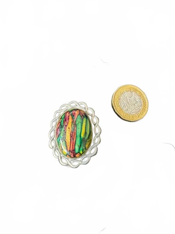 Vintage Vintage colourful oval brooch with silver frame