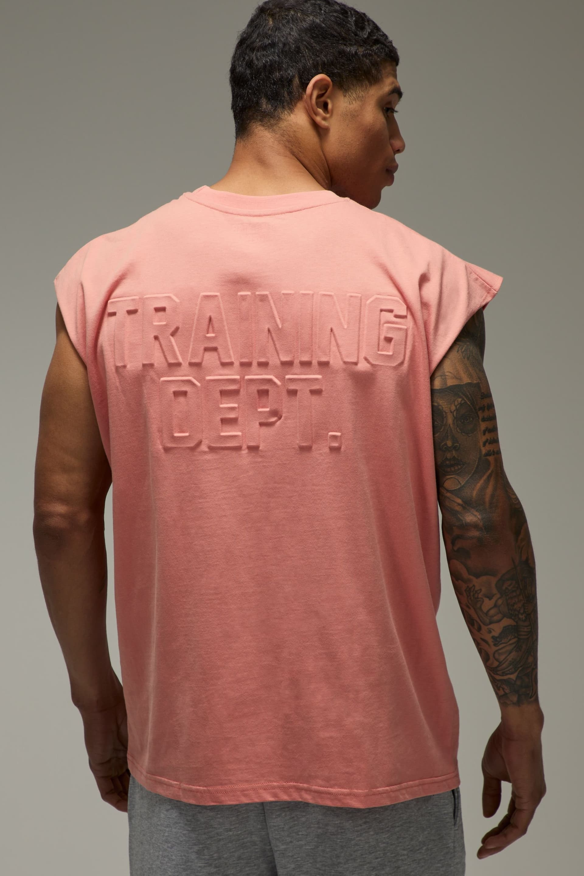 Training Dept. Training Dept. Men's Training Dept Oversized Embossed Tank in Pink