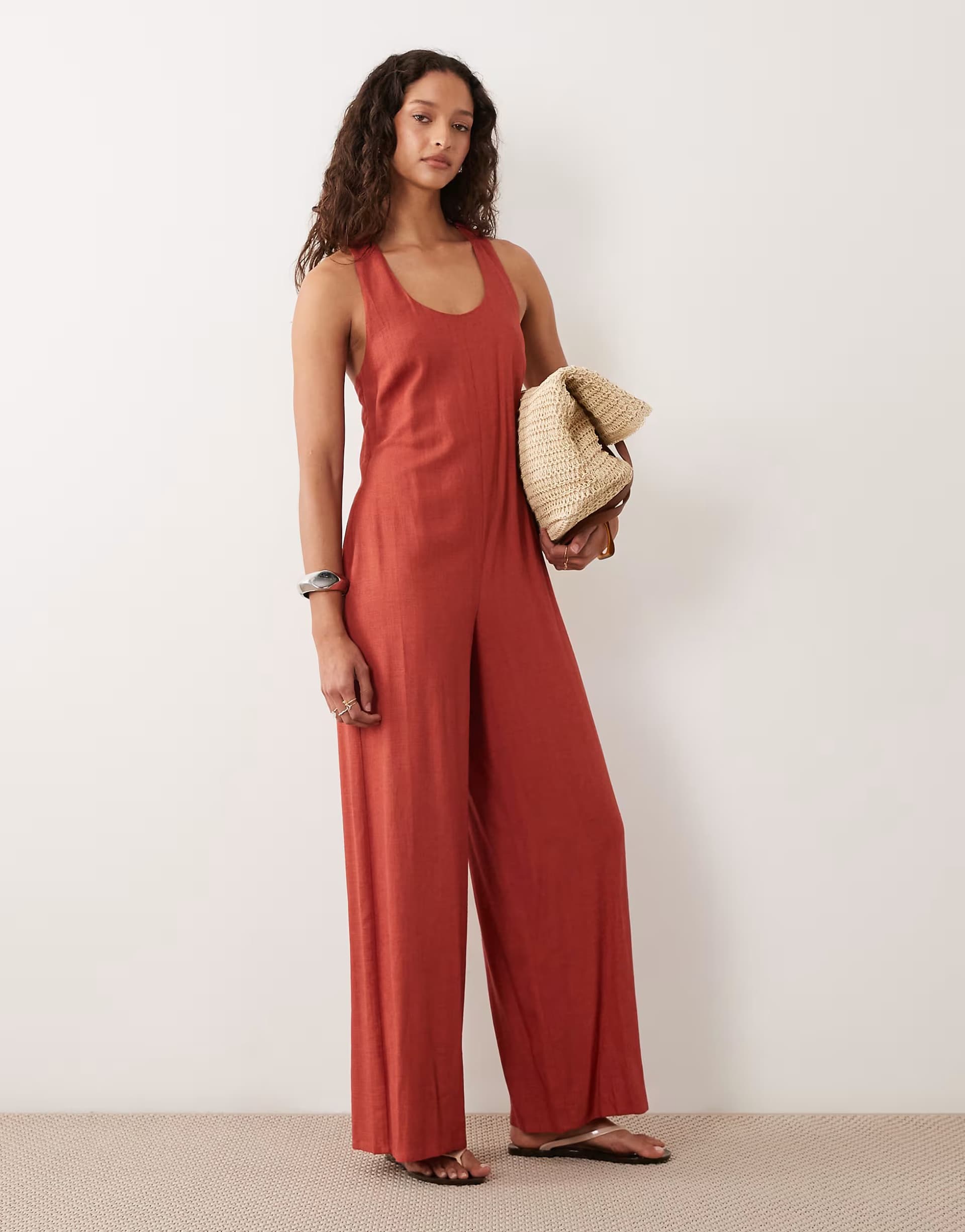 ASOS ASOS DESIGN wide leg jumpsuit with twist back in rust