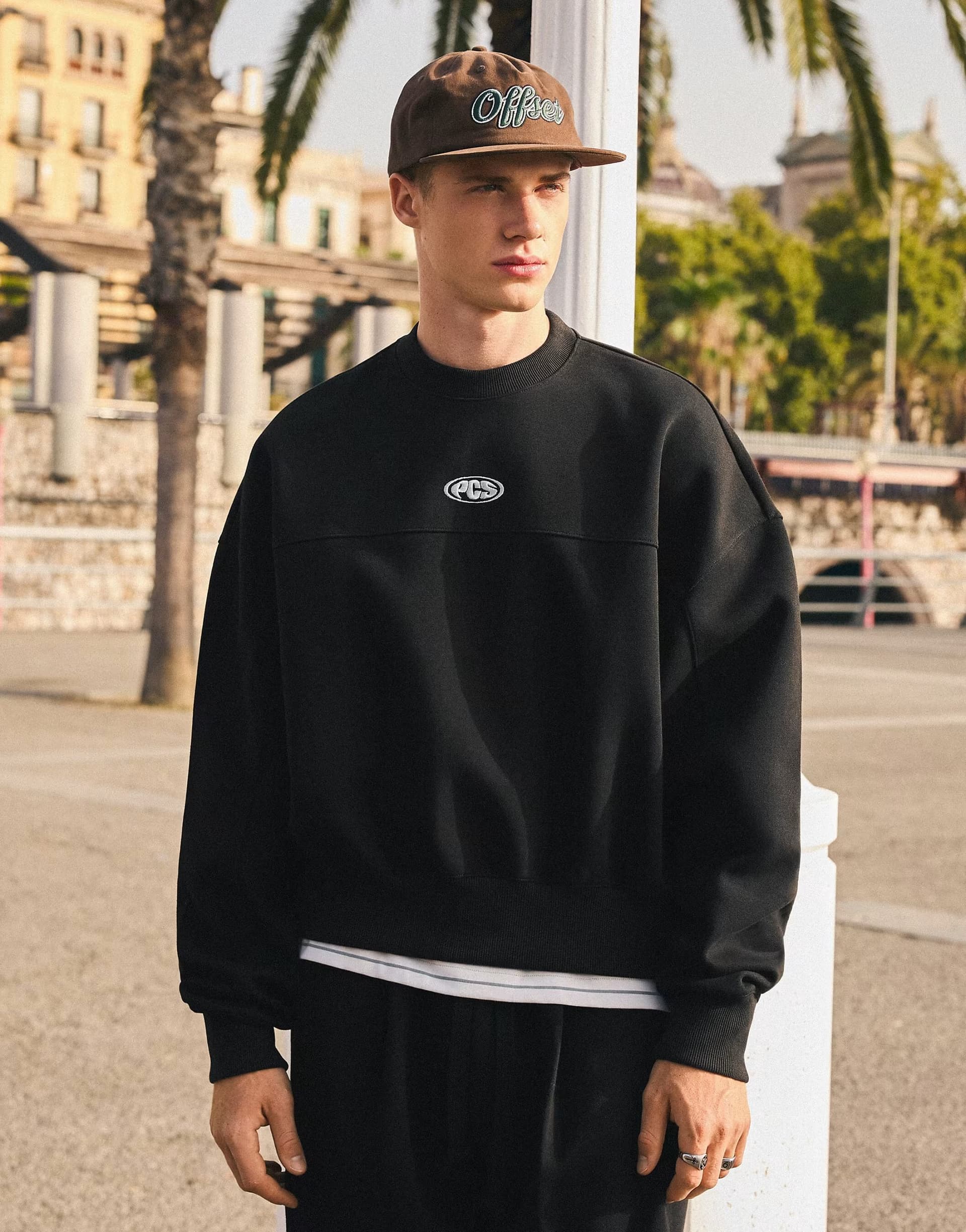 ASOS Bershka Boxy crew neck sweatshirt in black