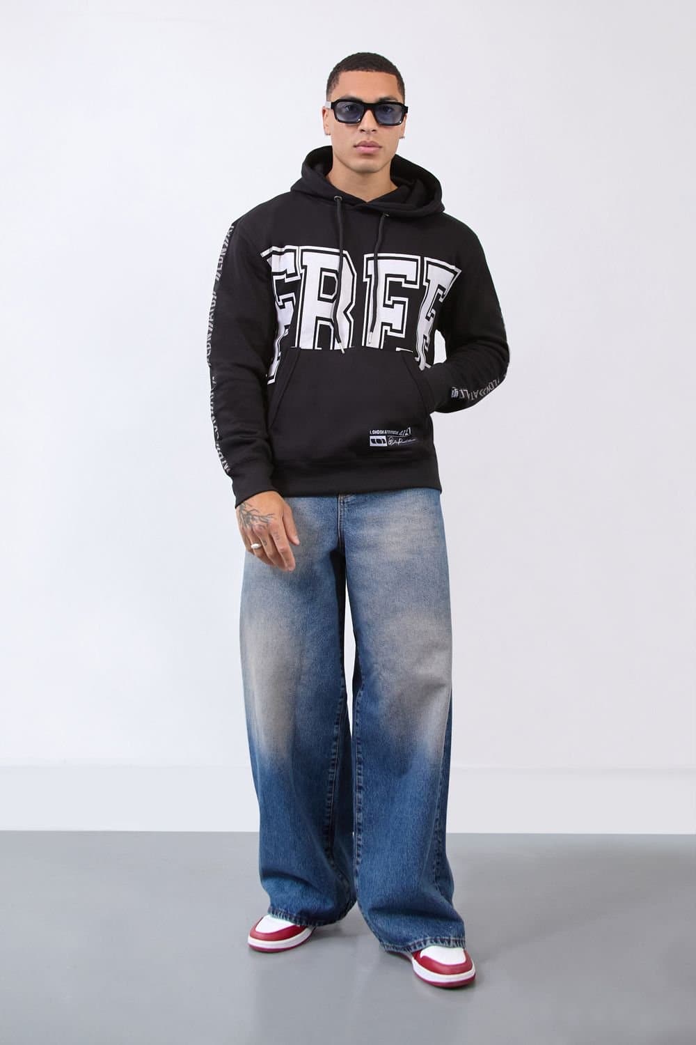 LONDON ATTITUDE LONDON ATTITUDE Men's Relax Fit Black Hoodie with Bold FREE Print & Sleeve Branding