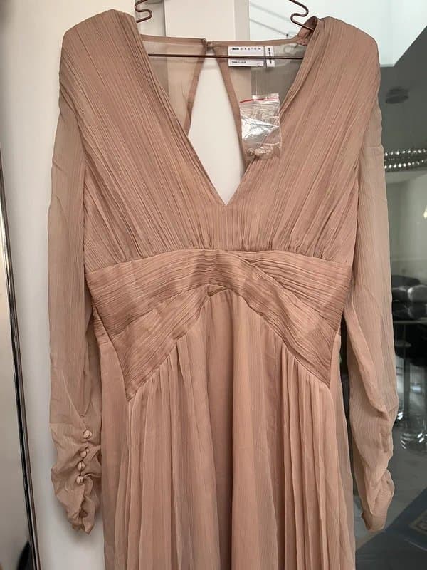 ASOS ASOS Design Bridesmaid ruched waist maxi dress with long sleeves and pleat skirt in light pink