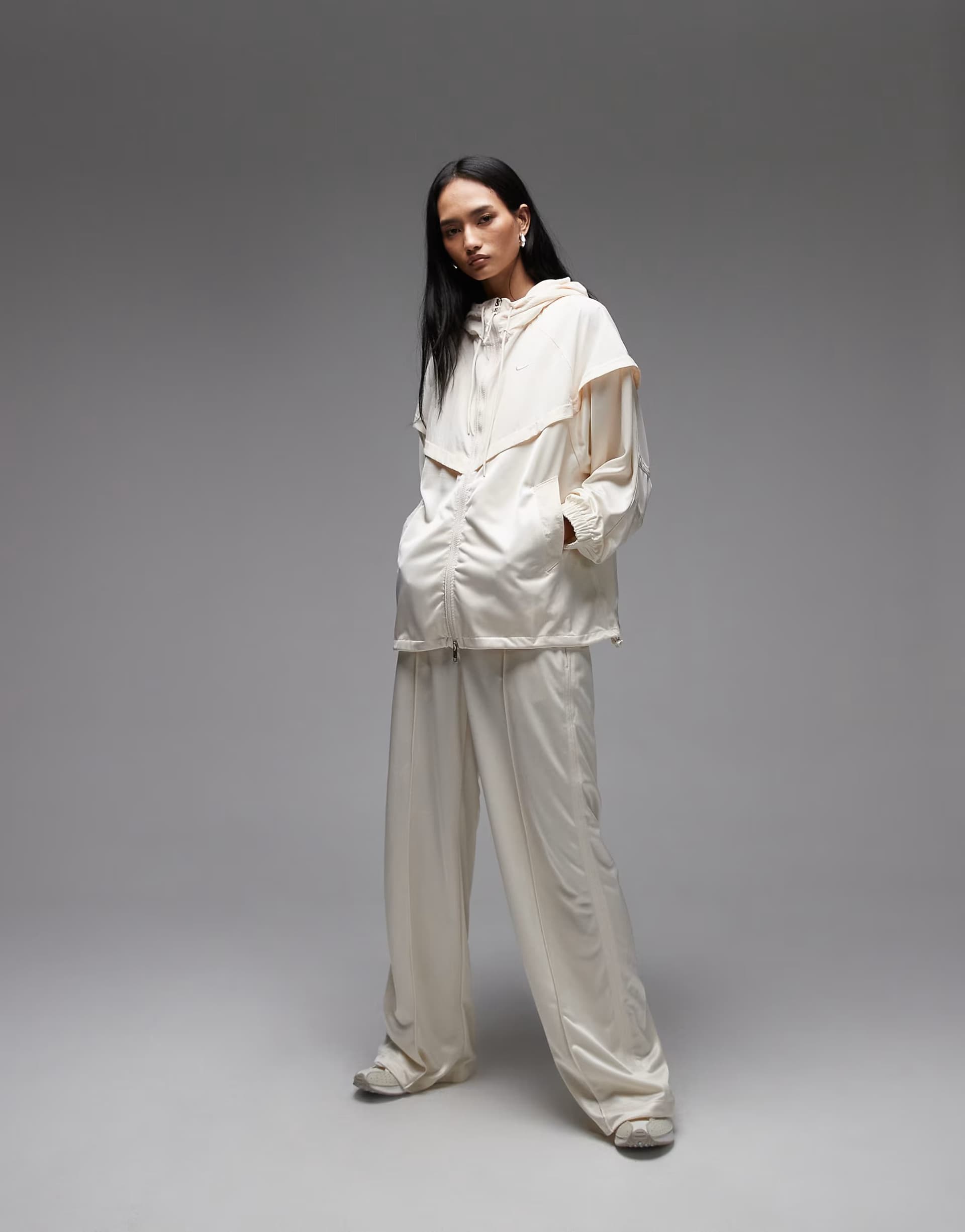 ASOS Nike straight leg trousers with belt in cream