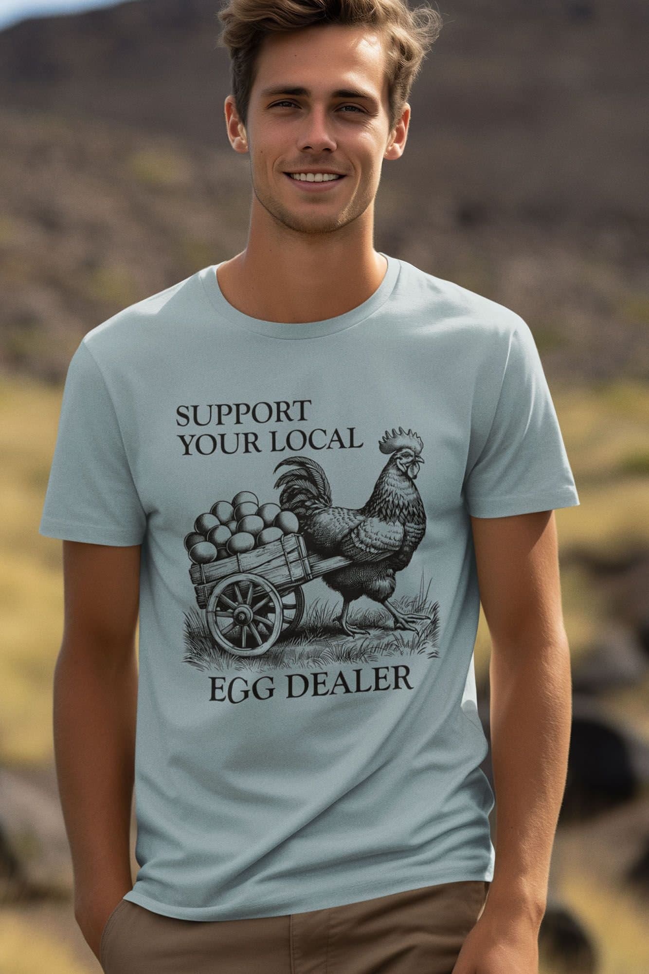 Bad Zebedee Bad Zebedee Men's Support Your Local Egg Dealer Chicken T-Shirt in Light Blue