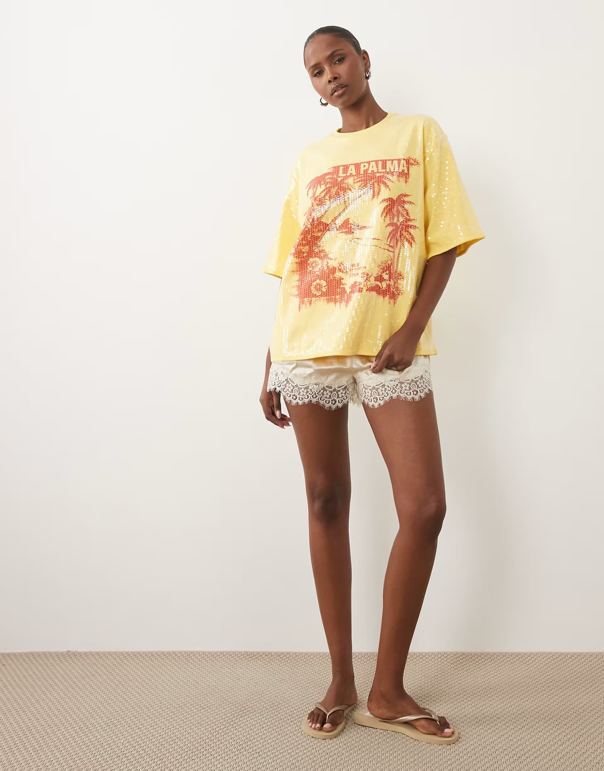 ASOS ASOS DESIGN Oversized drop sleeve T-shirt with La Palma graphic in yellow sequin