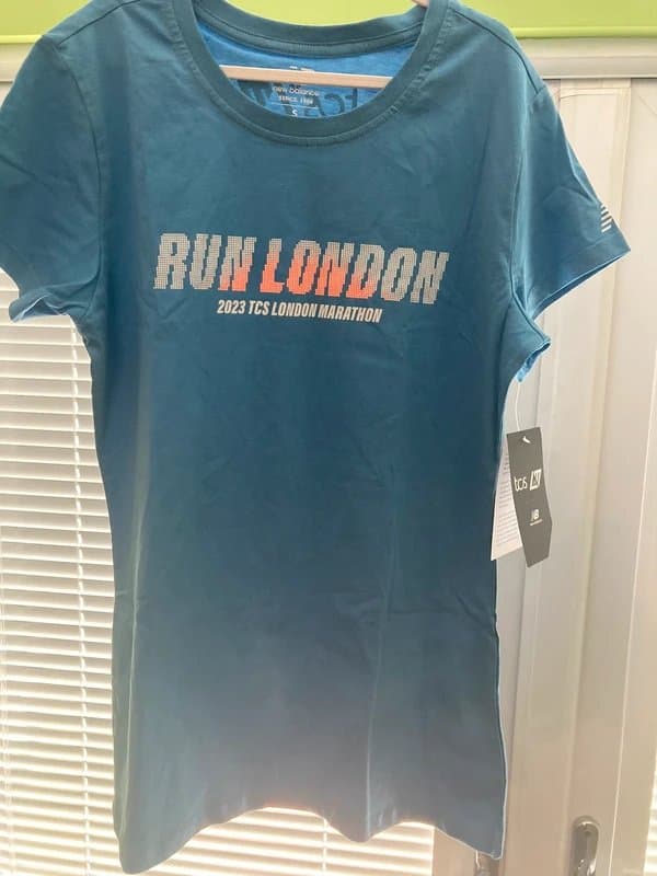 New Balance New balance women’s blue run London t-shirt in a size Small BNWT