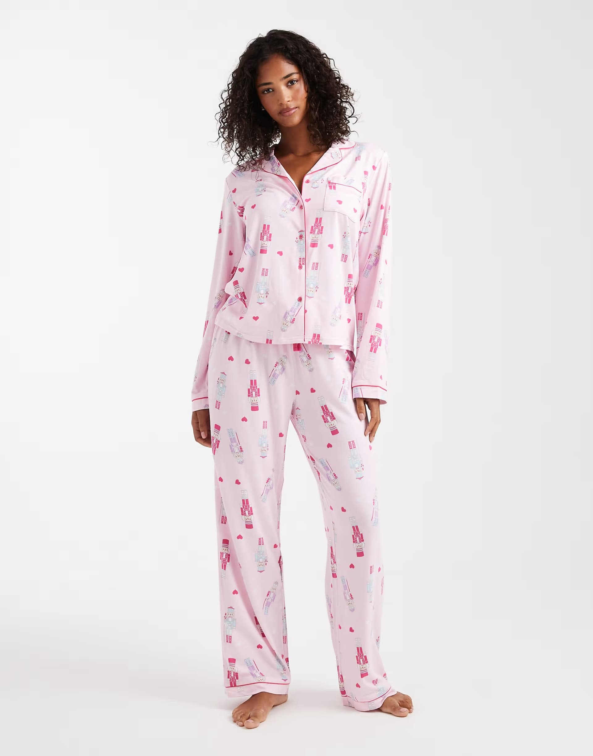 ASOS Loungeable Christmas super soft jersey revere top and wide leg pyjama set in pink nutcracker print