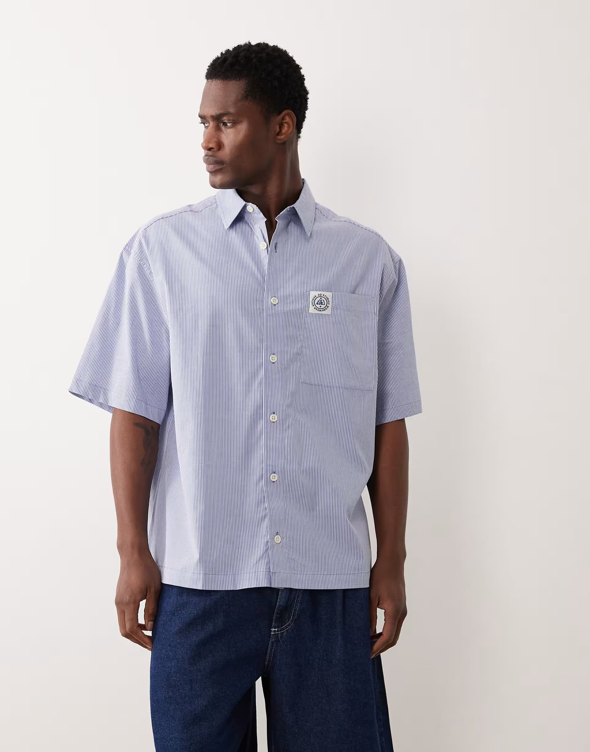 ASOS ASOS DESIGN oversized stripe shirt with chest badge in blue