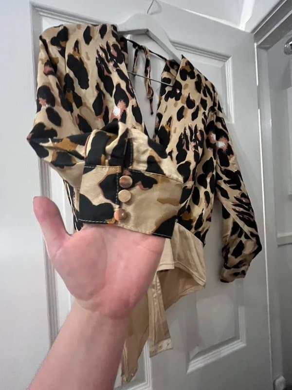 Missguided Size 16 missguided leopard print deep V bodysuit.