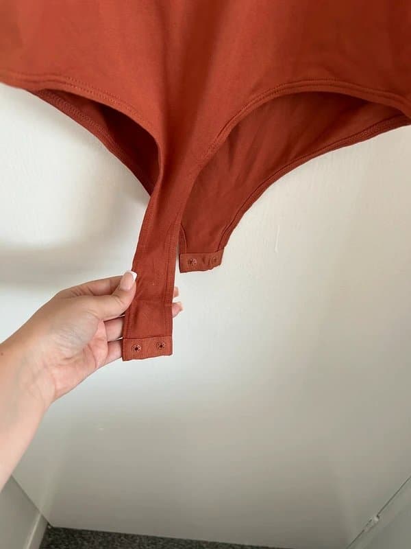 H&M H&M rust bodysuit BNWT