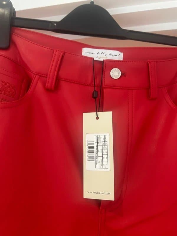 Never Fully Dressed NFD red vegan leather jeans