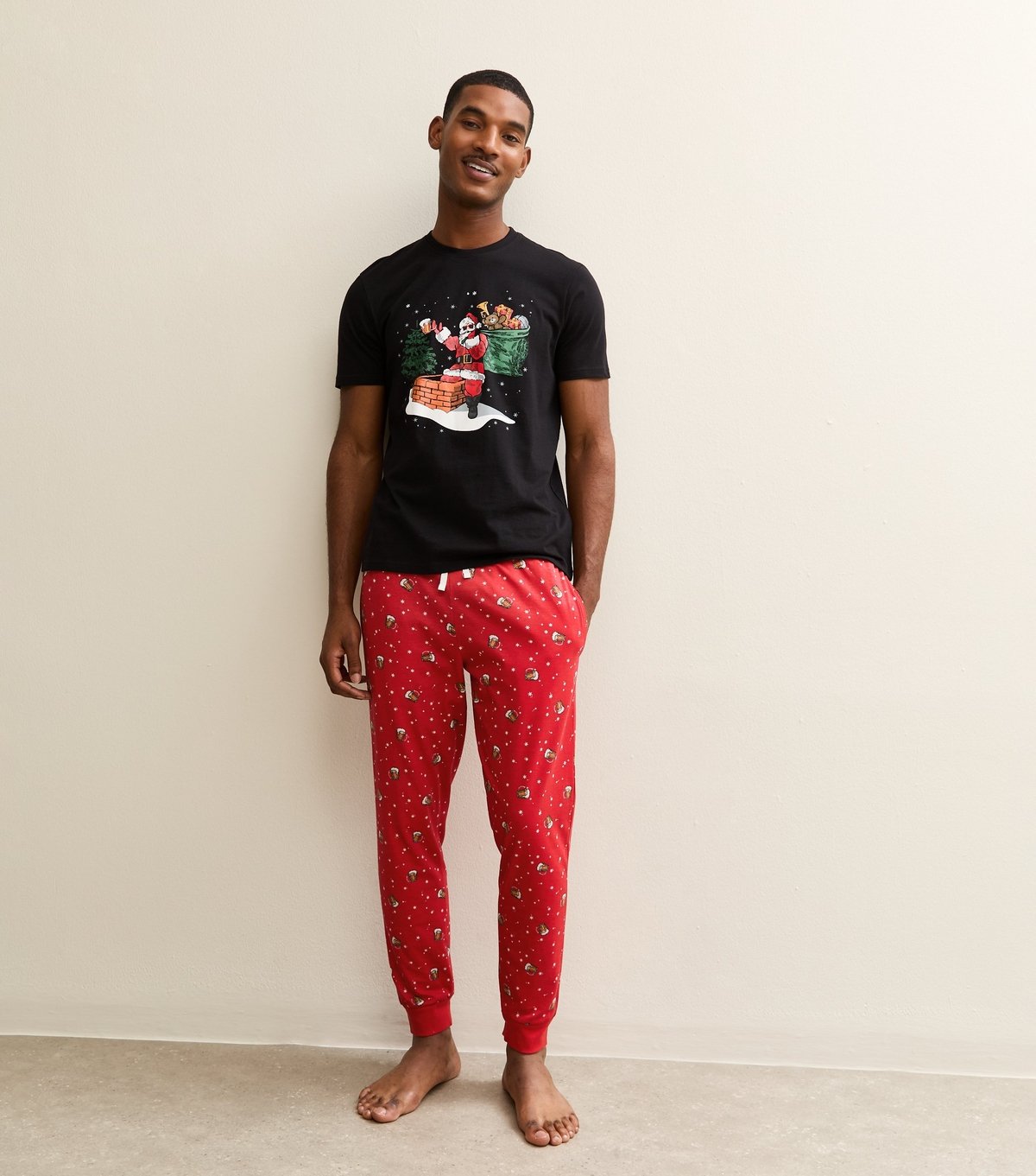 New Look Men's Red Regular Santa Print Top and Tapered Bottoms Pyjama Set New Look - 1