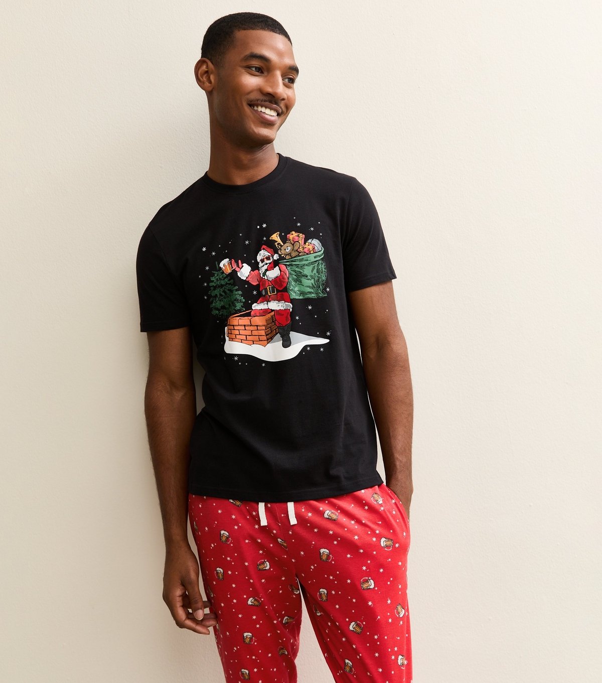 New Look Men's Red Regular Santa Print Top and Tapered Bottoms Pyjama Set New Look - 2
