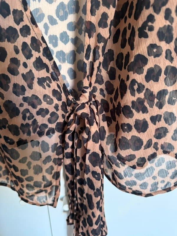 Never Fully Dressed Never fully dressed leopard blouse