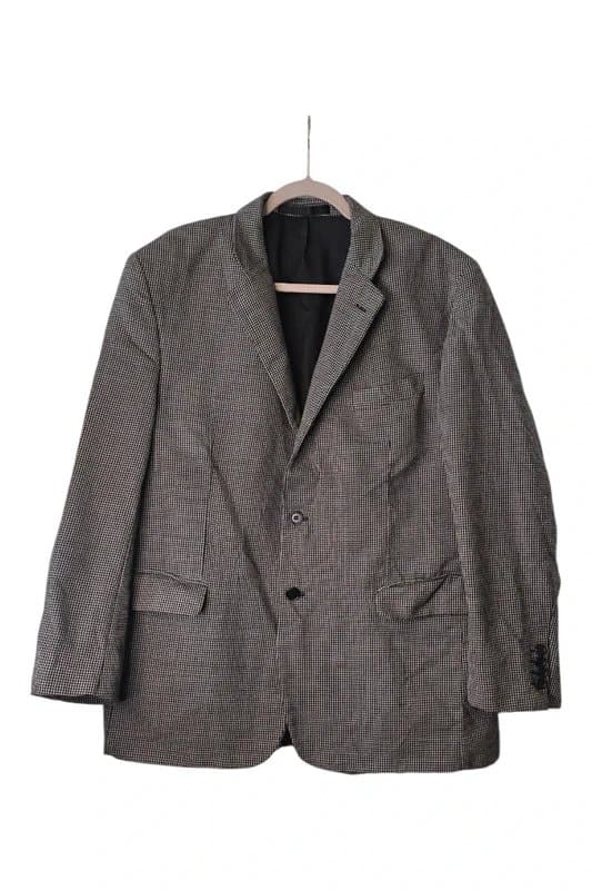 Marks & Spencer Classic  blazer in a refined grey‑black houndstooth pattern.