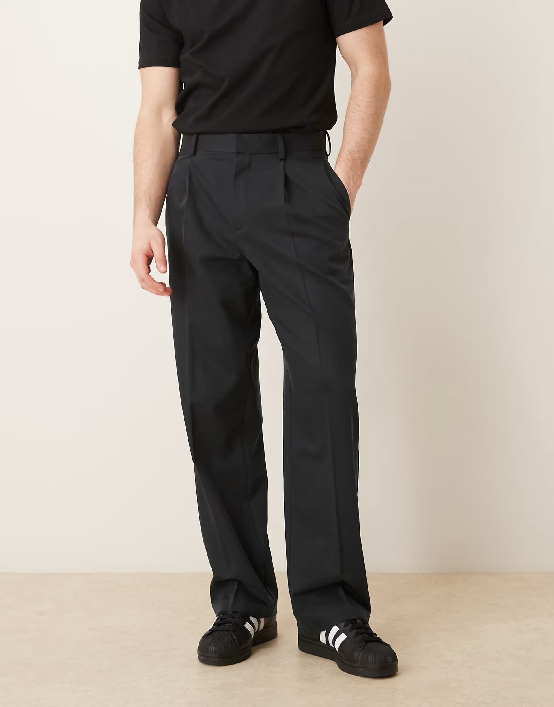 ASOS ASOS DESIGN smart pleated wide leg trousers in black twill