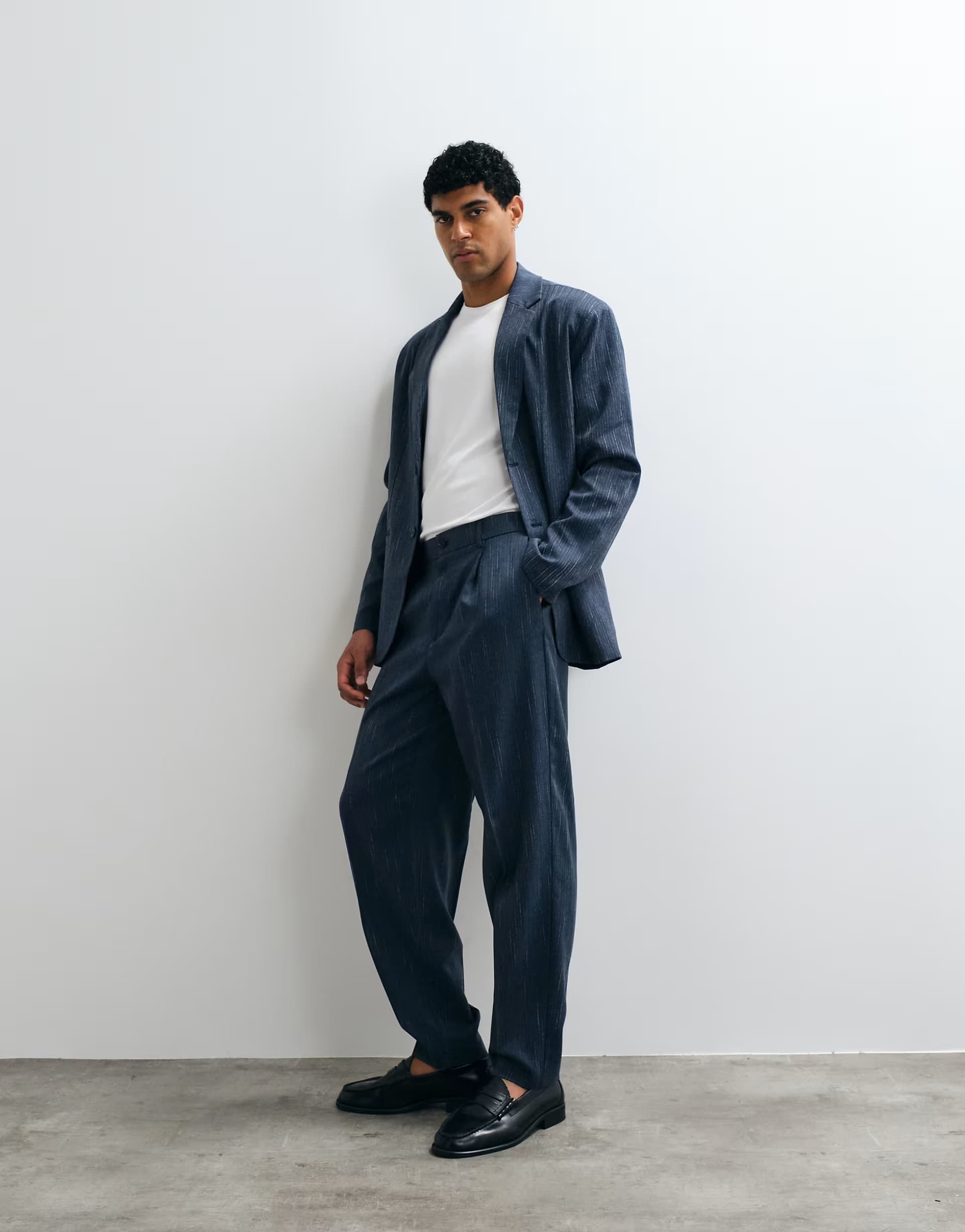 ASOS ASOS DESIGN oversized tapered denim look suit trousers with quarter elasticated wasitband in navy pinstripe