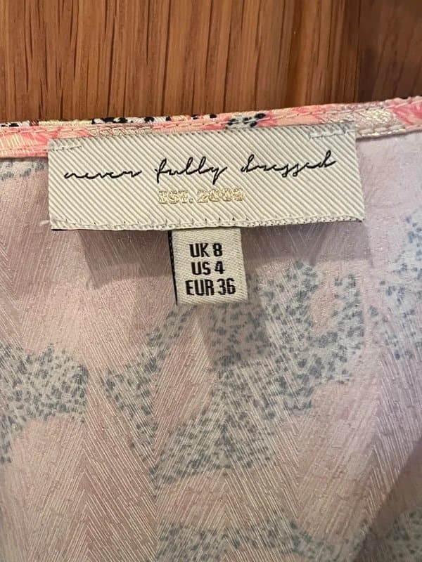 Never Fully Dressed Never Fully dresses wrap style dress