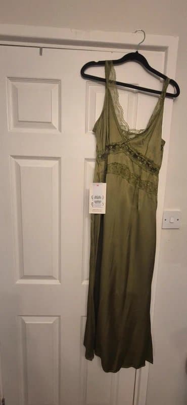 Never Fully Dressed Never fully dressed brand new Olive Green Satin dress 12